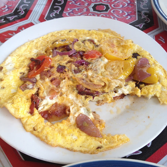 Ging-ging's Restaurant in Malapascua Island Daanbantayan Cebu Philippines Bacon, tomato, and onion omelet at Ging-ging's Restaurant in Malapascua Island Daanbantayan Cebu Philippines
