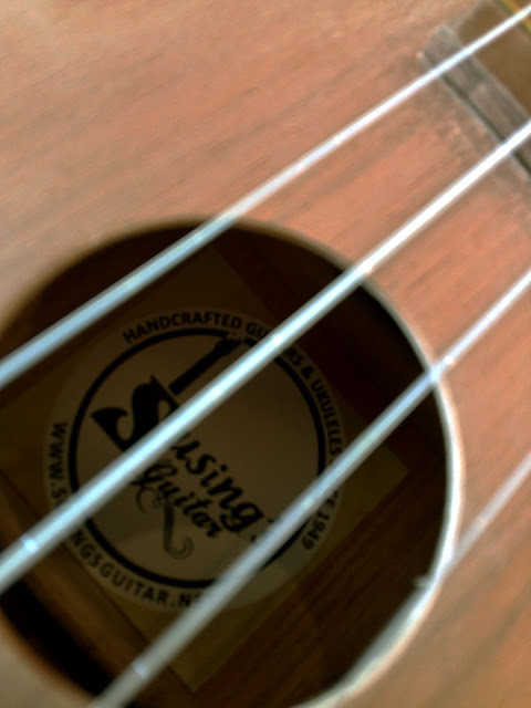 UkeHUB Kafe in Mactan Island Lapulapu City Cebu Philippines Susing's Guitar-branded ukuleles at UkeHUB Kafe in Mactan Island Lapulapu City Cebu Philippines
