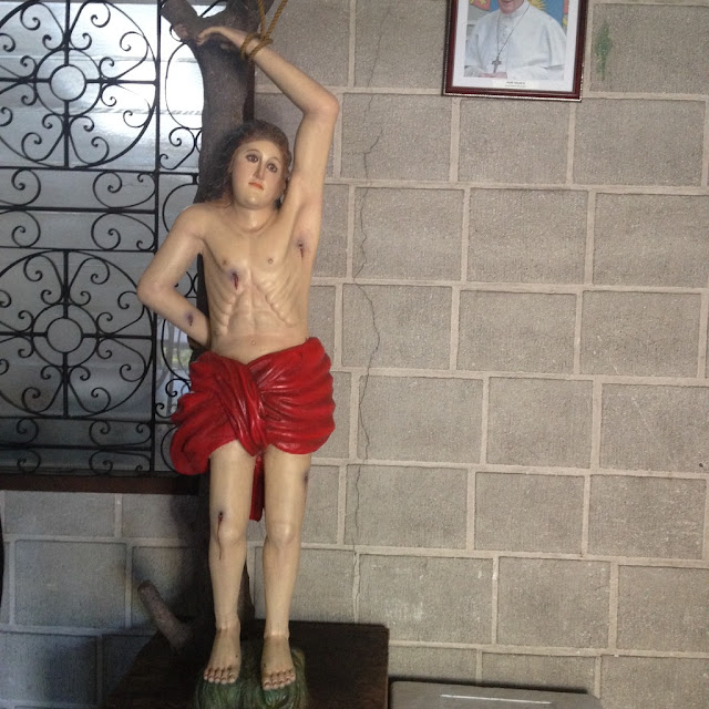Bishop's House in Bacolod City Negros Occidental Philippines Image of Jesus Christ tied to a tree at the Bishop's House