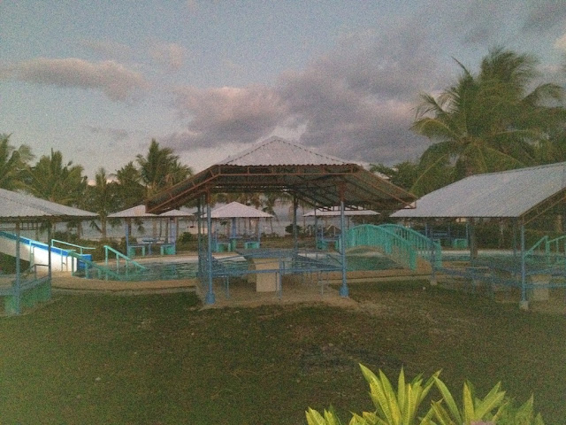 Virgin Beach Resort in Cebu Daanbantayan Philippines Cottages by the swimming pool at Virgin Beach Resort